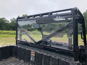 Trail Armor Ranger XP rear window dust shield installed, angled outdoor view from bed