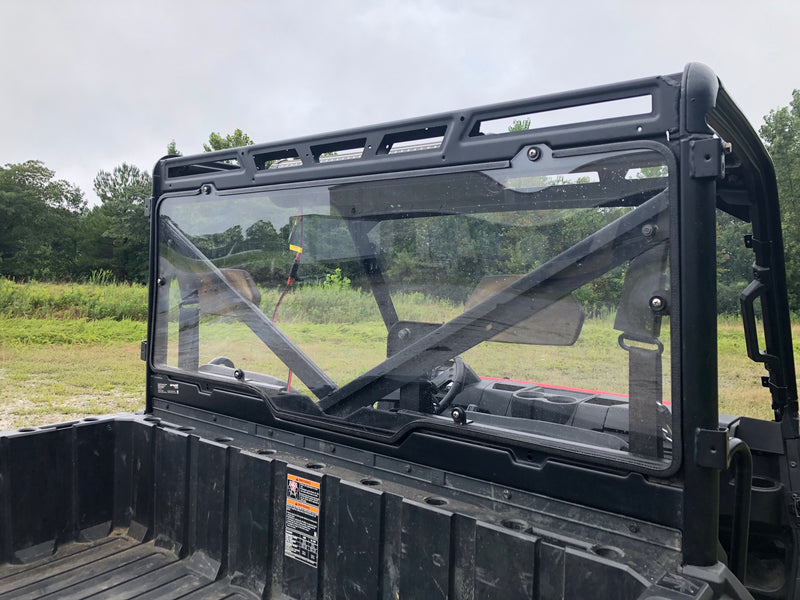 Trail Armor Ranger XP rear window dust shield installed, angled outdoor view from bed
