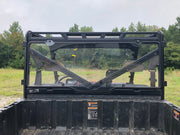 Trail Armor Ranger XP rear window dust shield installed, outdoor daylight view from bed
