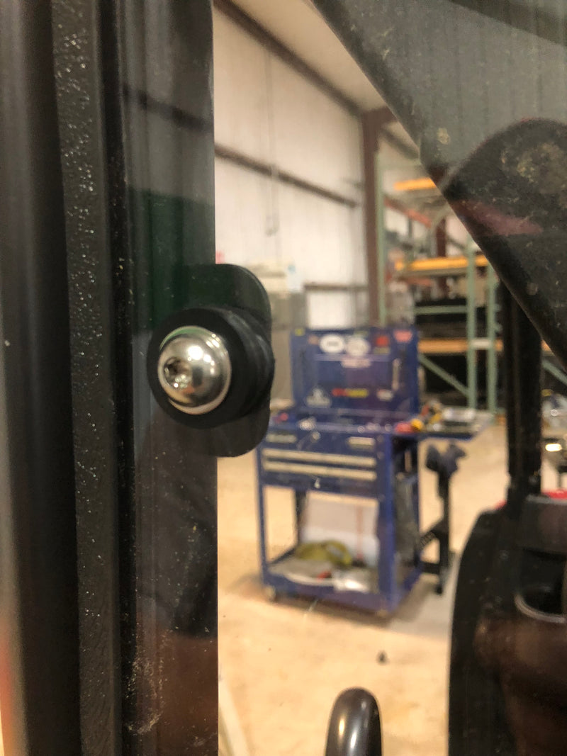 Trail Armor Ranger XP rear window dust shield mounting hardware, edge bolt closeup view