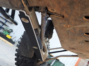 Trail Armor RZR PRO R trailing arm guard installed, front mounting bracket near pivot point