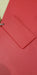 Trail Armor Super Tough Polymer skid plate shown in red color option outdoors
